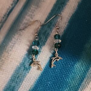 Elegant Silver Dolphin Earrings with Green Beads